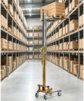 Heavy Duty Manual Lifting Stacker For Easy Cabinet Install And Material Handling With Smooth Rolling Wheels To Move Loads Up To 80kg in a warehouse.