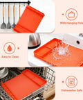Silicone Grill Mat For Blackstone 16x11.5 Inch Non Slip Tool Mat with hanging hole, easy to clean, dishwasher safe in orange.