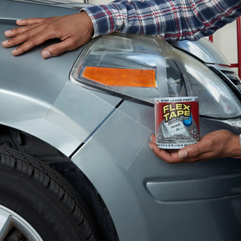 Applying Ultra Strong Waterproof Tape That Seals Leaks On Wet Surfaces And Underwater, Clear 8 Inch By 25 Foot Roll For Indoor Outdoor Use on car