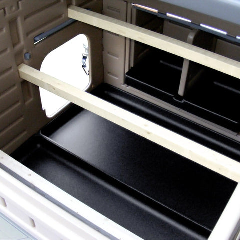 Interior of Snap Lock Large Chicken Coop For Backyards showing durable plastic construction and roosts.