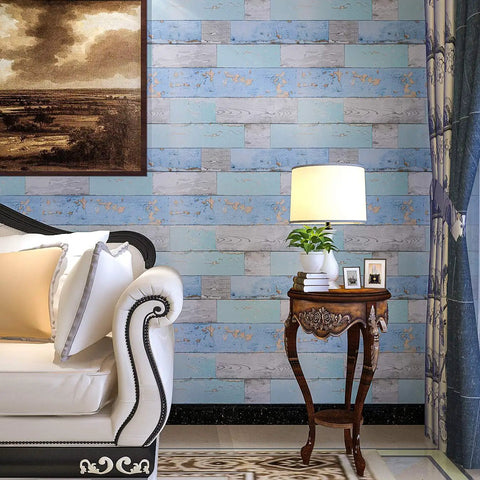 Peel And Stick Wood Grain Wallpaper In Blue Distressed Finish Self Adhesive Vinyl Film For Kitchen Counters Cabinets Furniture Shelves And Desks Waterproof And Oil Proof Durable DIY Friendly Decor Roll 17.7 By 78.7 Inches, displayed on a living room wall with ornate table and lamp.