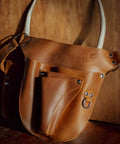 Durable Leather Garden Tool Belt For Women A Handy Garden Tools Organizer Holster Pouch in Cognac leather on display