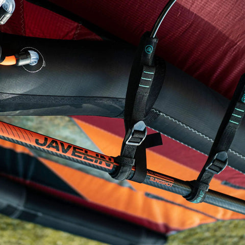 Close-up of Javelin Adjustable Carbon Boom V1 for Wing Foil with ergonomic grip and secure straps