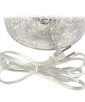 Close-up of Textured Glass Table Lamp With Clear Blue Dome Base And White Fabric Drum Shade, power cord attached