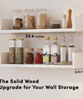 Fresh White Floating Wall Shelves Set Of Four U Shaped Wall Mounted Bookshelf with jars and bottles for kitchen storage.