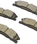 Bosch BC1611 front ceramic brake pads, 4-pack, with worn brown friction surfaces