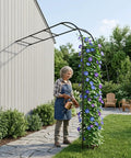 Half Garden Arch Trellis For Climbing Plants Outdoor, Wall Mounted Beefy Black Metal Arbor, 98.4 W x 94.8 H next to a walkway