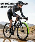 Cyclist on gravel road using 2 Pack Gravel TPU Bike Inner Tubes For 700x32-47C And 29 Inch MTB Tires, Removable Valve Core