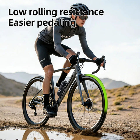 Cyclist on gravel road using 2 Pack Gravel TPU Bike Inner Tubes For 700x32-47C And 29 Inch MTB Tires, Removable Valve Core