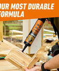 Ultimate Heavy Duty Construction Adhesive 9 Oz Cartridge White 100 Percent Waterproof Instant Grab Paintable Indoor And Outdoor Use For Demanding Repairs applied to wood joint