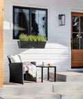 Plastic Railing Planter With Adjustable Brackets For Outdoor Balcony And Fence displayed on porch wall with green plants