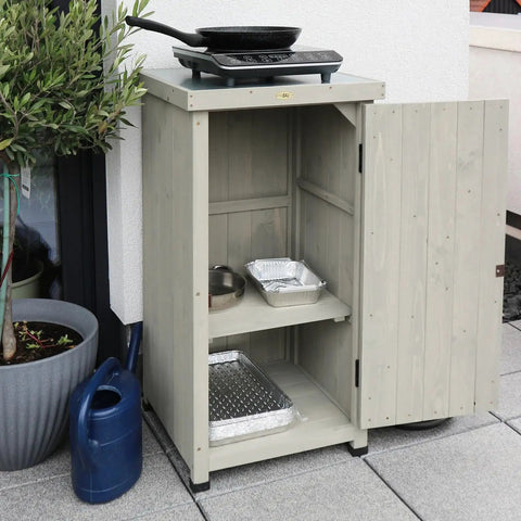 Backyard Ready Weatherproof Outdoor Storage Cabinet With Potting Bench Table Shelves And Rust Proof Metal Top For Patio And Garden Easy Assembly With Numbered Parts Water Seal Coating Wooden Planting Work Station with open door showing shelves on patio.