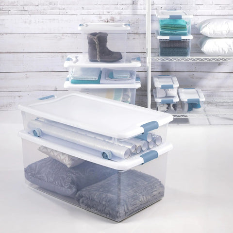 No Hassle Clutter Crusher, Slick Locking Lids, Heavy Duty Stackable Containers For Closet And Home Organization, roomy 56 quart capacity, clear with white tops.
