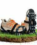 Flexible Lawn Aerator Shoes With Adjustable Straps And Durable Spikes For Easy Garden Aeration, shown on grass patch