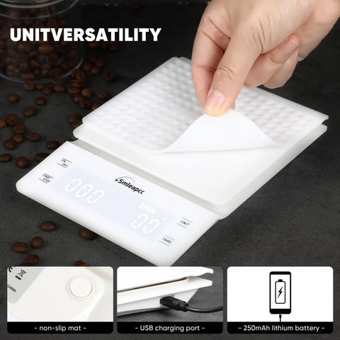 White Spot On Accuracy Digital Kitchen Scale with textured mat lifted, USB charging port, and coffee beans.