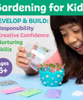 Child using Mini Axolotl Terrarium STEM Kit for Kids A Hands On Garden Experience With Egg Shaped Tank Plant Chia Seeds And Cute Axolotl Toys