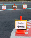 Set Of 12 Yellow Traffic Cone Sleeves With Pockets For Caution Notes And Signs Safety Message Sign Covers on orange traffic cones on pavement