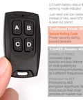 Hand holding transmitter of Secure Wireless RF Remote Control Relay Switch Kit With 2 Channel Receiver And 2 Transmitters