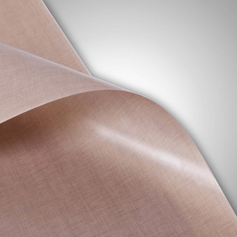 Close-up of Nonstick Teflon PTFE Sheet Roll With Adhesive Backing, 5 Mil Thick, 100 Cm By 5 Yd, for heat press and craft projects.