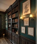 Rechargeable Battery Wall Sconces Set Of Two Black Cordless Lights For Modern Homes No Sweat Install on a green wall with books.