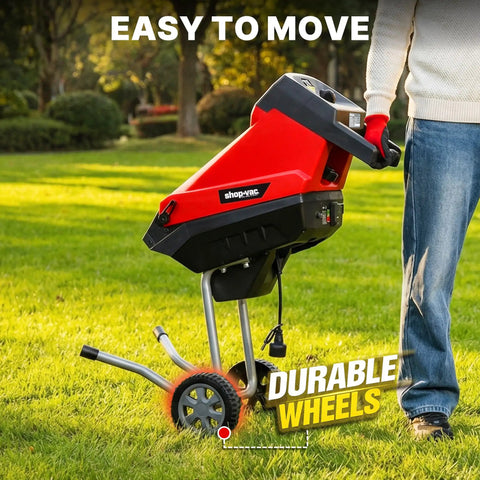 Powerful 15 Amp Electric Wood Chipper Shredder for Easy Yard Cleanup, red and black, on grass with durable wheels