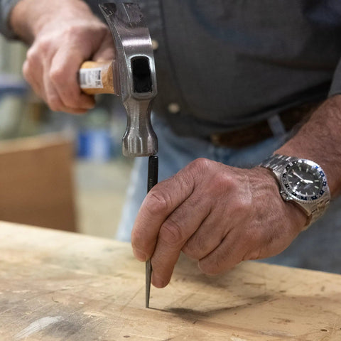 Using 16 Piece Punch And Chisel Set With Pin Punches And Center Punches For Metalwork, Auto Repair And DIY Projects, aligning a pin