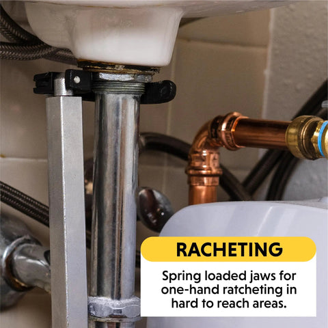Telescoping Basin Wrench With Large Pivoting Jaw Extends From 11 To 16 Inches Fits 1 To 2 Inch Nuts And Feed Lines One Hand Ratcheting in use under sink