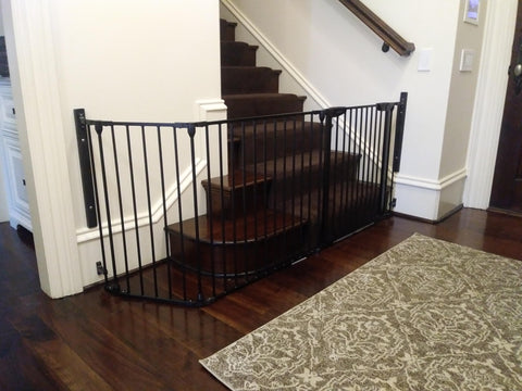 Expandable Extra Wide Baby Gate For Kids And Pets Fits 30 To 90 Inches In Black, installed at stairway entrance