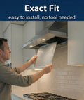 Man installing 4X Stove Hood Vent Filter 10.5 X 8.75 Inch Replacement For Broan Nutone Range Hood BP29 under kitchen exhaust fan.