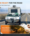 RV towing a boat on a trailer with text warning about tie down requirements for marine equipment transport on highway.