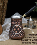 Handmade Copper Turkish Cezve Set Of 3 Extra Large And Medium Pots For Rich Turkish Coffee Dope Copper Pot With Pyramid Pattern And Antique Finish For Home Barista Use with wooden handle shown from the side with a focus on design.