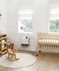Infrared WiFi Space Heater 1000 Watt Smart Control With App Auto Shutoff Safety Grill mounted on wall in nursery room