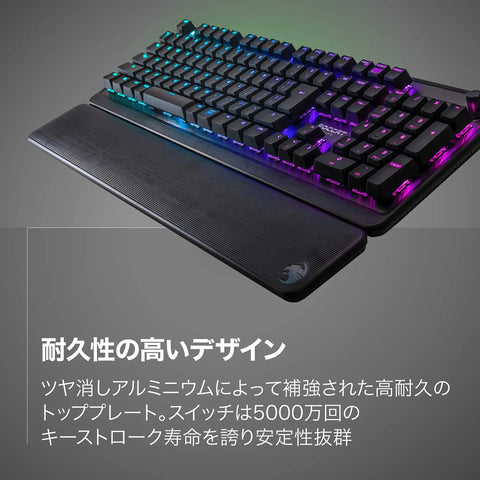 Clean Build Mechanical RGB Gaming Keyboard With Smooth Linear Red Switches And Fully Lit Backlight Brushed Aluminum Plate Removable Palm Rest Anti Ghosting Tech For Top Shelf Setup On Any Gamer Rig from a diagonal angle showing RGB lighting and textured palm rest.