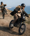 Teens riding Electric Dirt Bike With Lights And Display For Off Road Adventures, 3840W Power, dual suspension on dirt trail