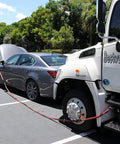 SUV connected to tow truck using Jumper Cables 30 Feet 1 Gauge 800 Amp With Permanent Installation Kit And Quick Connect Plug