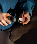 Craftsman using rotary tool with 12 Piece Leather Edge Burnishing Bits For Rotary Tools Leather Polishing Bits Pro Grade Kit.
