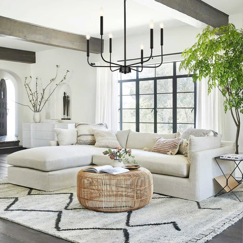 Six Light Industrial Black Chandelier For Dining Room And Living Space Dope Modern Farmhouse Pendant Light Hanging Ceiling Fixture Perfect For Kitchen Island Hallway Bedroom Foyer over a modern living room with sofa and rug.
