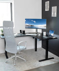Corner Standing Desk With Electric Height Adjustment 63 X 55 Inch Reversible L Shaped Workstation in home office setup