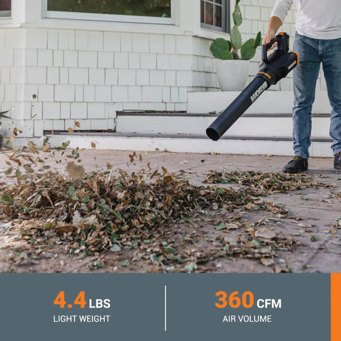 Man using 360 CFM leaf blower from 20V Cordless Yard Work Ready Bundle to clear leaves on patio