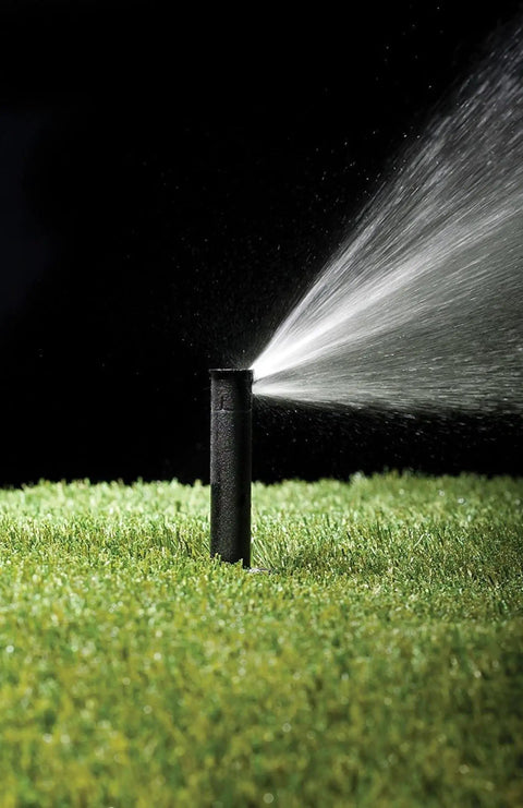 Pressure Regulating Dual Spray Pop Up Sprinkler With 90 Degree Quarter Circle Pattern And 8 To 15 Foot Spray Distance, 4 Inch Pop Up Height, Water Saving Regulator Delivers Constant 30 PSI For Consistent Irrigation spraying water on grass
