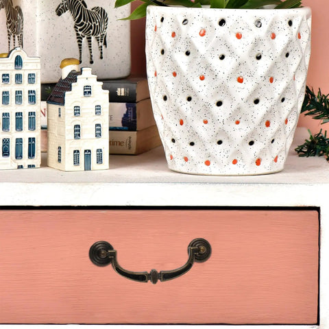 Vintage Zinc Alloy Cabinet Pull Handles 4 Pack for Furniture Doors and Drawers on pink drawer front with decor items