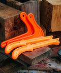 4 Pack Safety Push Sticks Set For Table Saw And Jointer, V Style Push Blocks And Straight Push Sticks, bright orange, on wood surface.