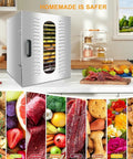 Big Batch Commercial Grade Electric Digital Food Dehydrator With Heavy Duty Trays For Fresh Fruits Veggies And Homemade Pet Jerky 1000 Watt 110 Volt Powerhouse Machine in a kitchen setting.