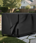Kickass Universal Generator Cover Waterproof 26X20X20 Inches black cover on portable generator outside on stone patio.