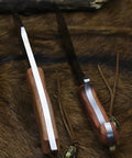 Survivor III Fixed Blade Knife With Full Tang 14.2 Inch DC53 Steel Blade leather cord detail on fur background