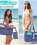Two women on the beach carrying Extra Large Waterproof Beach Bag Tote With Zipper Wet Pocket 50L Capacity Ideal Pool Bag For Women And Men