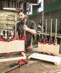 24 Inch Woodworking Parallel Clamp that cranks up 1000 lbs of clamping pressure in use, workbench setup