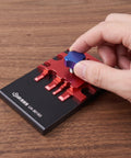 Hand adjusting Metal Etching Sheet Bender Tool for Photo Etched Parts and Model Assembly on wooden table
