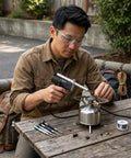 Person using Dual Watt Soldering Gun 400 And 150 Heavy Duty with Trig R Heat Control outdoors for repair work