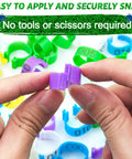 Hands holding purple clip from 8mm Pigeon Leg Bands Kit, 100 Pcs Clip On Bird Foot Rings With 5 Bright Colors, showing secure snap design.